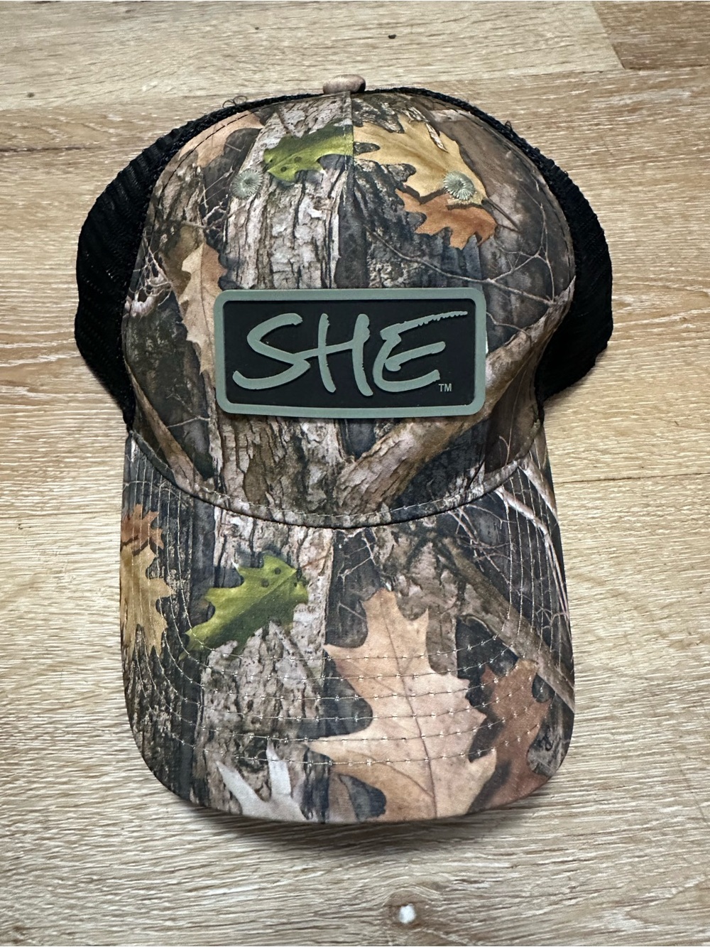 SHE x Bass Pro Shop Camo Trucker Hat